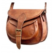 7. Skórzana torebka damska na ramie, wykonana ręcznie z naturanej skóry. Kolor: brązowy. Rozmiar: 9"-13"